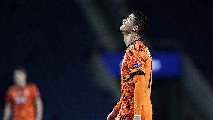Juventus Cristiano Ronaldo reacts during the Champions League round of 16, first leg, soccer match between FC Porto and Juventus at the Dragao stadium in Porto, Portugal, Wednesday, Feb. 17, 2021. (AP Photo/Luis Vieira)