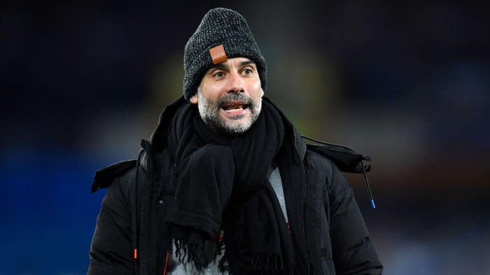LIVERPOOL, ENGLAND - FEBRUARY 17: Pep Guardiola, Manager of Manchester City reacts prior to the Premier League match between Everton and Manchester City at Goodison Park on February 17, 2021 in Liverpool, England. Sporting stadiums around the UK remain under strict restrictions due to the Coronavirus Pandemic as Government social distancing laws prohibit fans inside venues resulting in games being played behind closed doors. (Photo by Peter Powell - Pool/Getty Images)