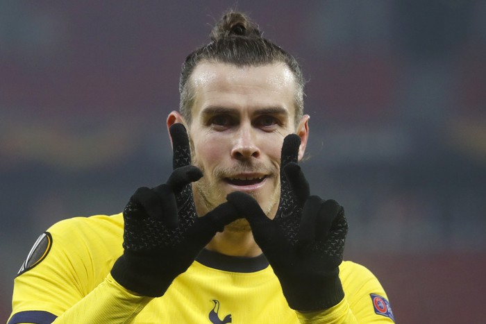 Tottenhams Gareth Bale celebrates after scoring his sides second goal during the Europa League round of 32, first leg, soccer match between Wolfsberger AC and Tottenham Hotspur at the Puskas Arena stadium in Budapest, Hungary, Thursday, Feb. 18, 2021. (AP Photo/Laszlo Balogh)