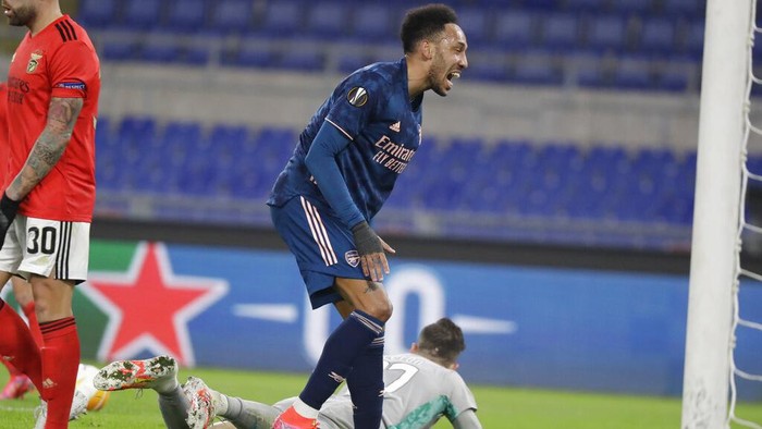 Arsenals Pierre-Emerick Aubameyang reacts after failing a scoring chance during the Europa League round of 32 first leg soccer match between Benfica and Arsenal, at Romes Olympic Stadium, Thursday, Feb. 18, 2021. (AP Photo/Andrew Medichini)