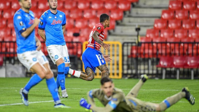 Granadas Kenedy celebrates after scoring a goal during the Europa League, round of 32, first leg soccer match between Granada and Napoli at the Los Carmenes stadium in Granada, Spain, Thursday, Feb. 18, 2021. (AP Photo/Jose Breton)