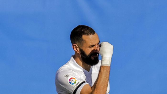 Karim Benzema Real Madrids Karim Benzema celebrates after scoring the opening goal during the Spanish La Liga soccer match between Real Madrid and Valencia at the Alfredo Di Stefano stadium in Madrid, Spain, Sunday, Feb. 14, 2021. (AP Photo/Manu Fernandez)