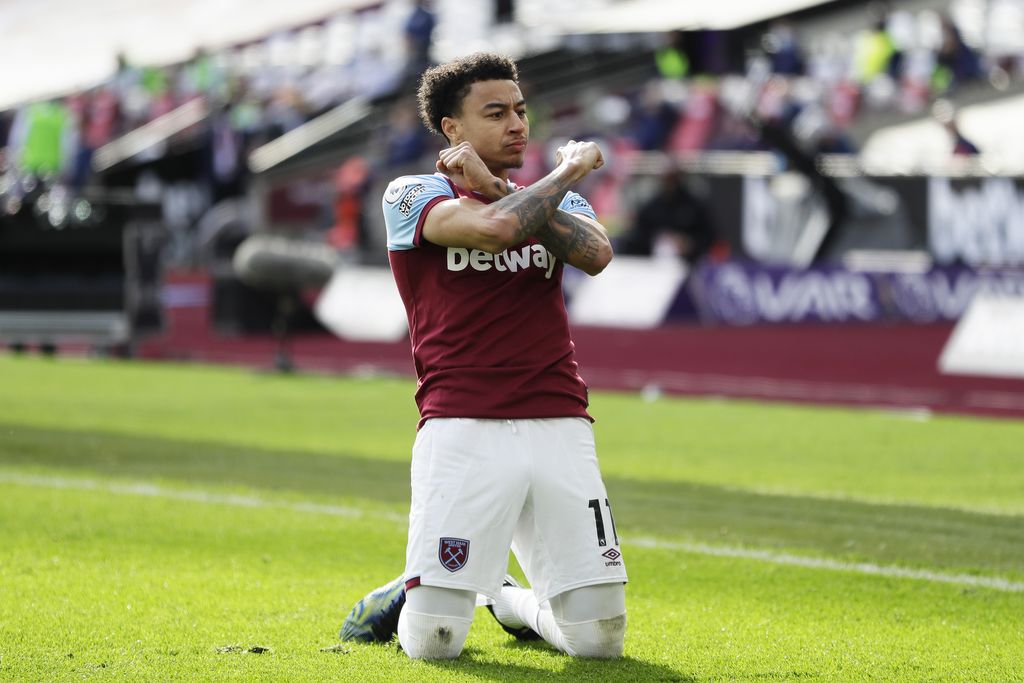 LONDON, ENGLAND - FEBRUARY 21: Jesse Lingard of West Ham United celebrates after scoring their side's second goal during the Premier League match between West Ham United and Tottenham Hotspur at London Stadium on February 21, 2021 in London, England. Sporting stadiums around the UK remain under strict restrictions due to the Coronavirus Pandemic as Government social distancing laws prohibit fans inside venues resulting in games being played behind closed doors. (Photo by Kirsty Wigglesworth - Pool/Getty Images)
