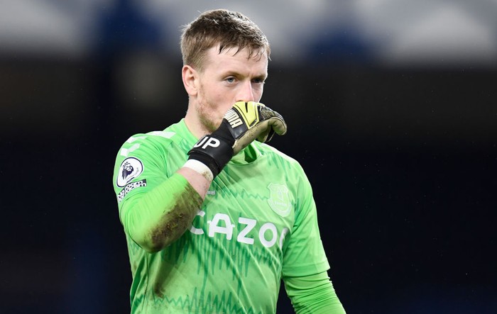 LIVERPOOL, ENGLAND - FEBRUARY 17: Jordan Pickford of Everton looks dejected after conceding his sides third goal during the Premier League match between Everton and Manchester City at Goodison Park on February 17, 2021 in Liverpool, England. Sporting stadiums around the UK remain under strict restrictions due to the Coronavirus Pandemic as Government social distancing laws prohibit fans inside venues resulting in games being played behind closed doors. (Photo by Peter Powell - Pool/Getty Images)