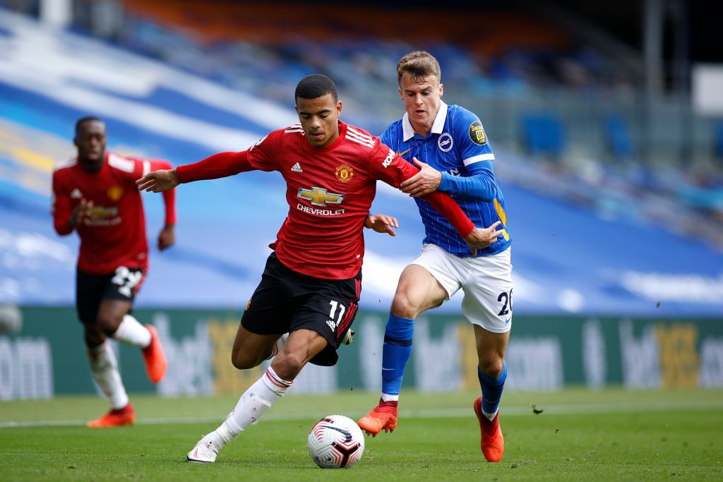 MANCHESTER, ENGLAND - DECEMBER 29: Mason Greenwood of Manchester United in action during the Premier League match between Manchester United and Wolverhampton Wanderers at Old Trafford on December 29, 2020 in Manchester, England. The match will be played without fans, behind closed doors as a Covid-19 precaution. (Photo by Michael Regan/Getty Images)