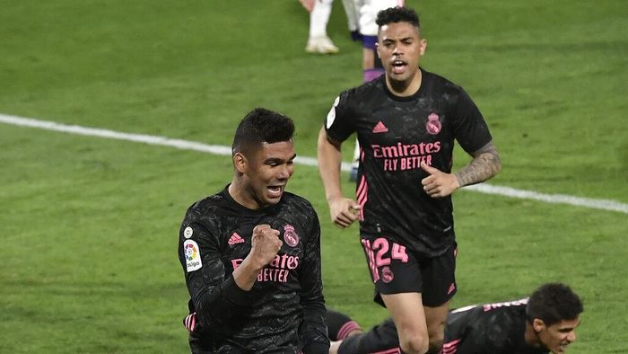 Real Madrid Real Madrids Casemiro celebrates after scoring his sides opening goal during the Spanish La Liga soccer match between Valladolid and Real Madrid at the Jose Zorrila stadium in Valladolid, Spain, Saturday, Feb. 20, 2021. (AP Photo/Alvaro Barrientos)