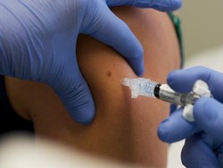 Australia Memulai Vaksinasi COVID-19 di Tengah Kontroversi