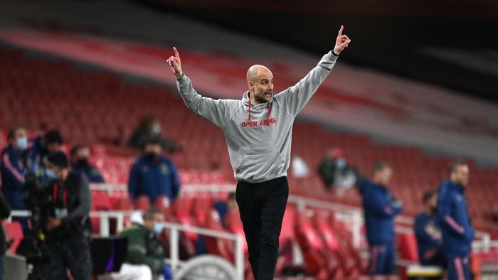 LONDON, ENGLAND - FEBRUARY 21: Pep Guardiola, Manager of Manchester City reacts during the Premier League match between Arsenal and Manchester City at Emirates Stadium on February 21, 2021 in London, England. Sporting stadiums around the UK remain under strict restrictions due to the Coronavirus Pandemic as Government social distancing laws prohibit fans inside venues resulting in games being played behind closed doors. (Photo by Shaun Botterill/Getty Images)