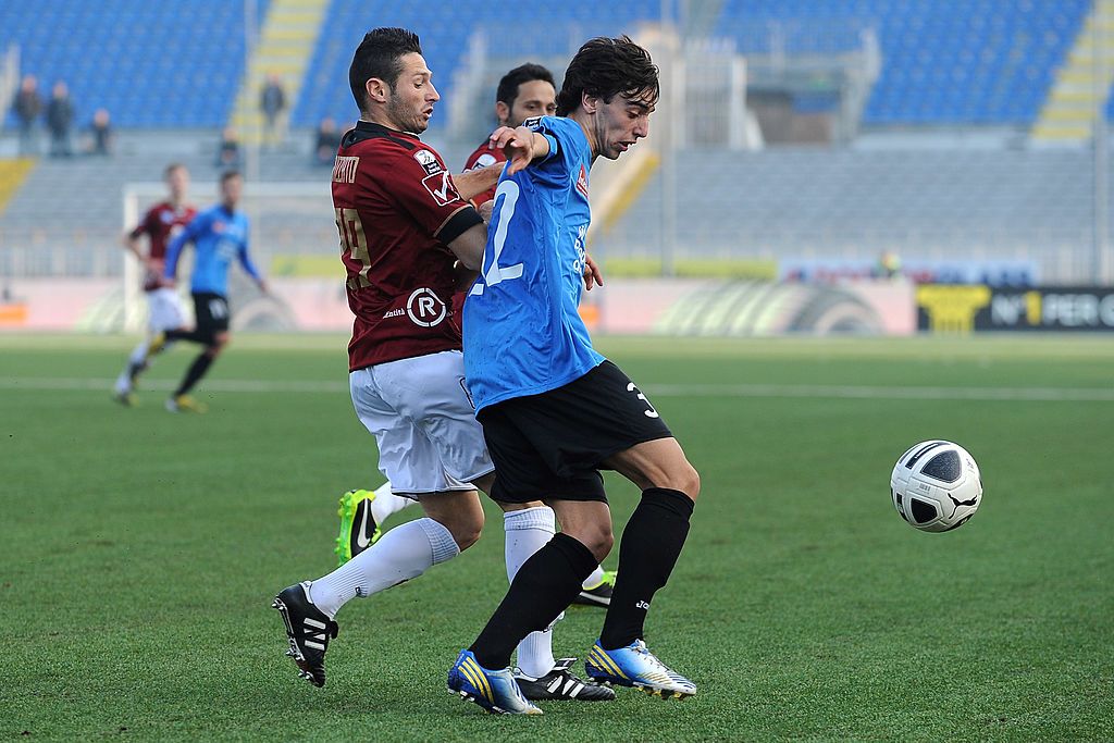 NOVARA, ITALY - MARCH 02:  Bruno Miguel Fernandes (R) of Novara Calcio is challenged by Simone Rizzato of Reggina Calcio during the Serie B match between Novara Calcio and Reggina Calcio at Silvio Piola Stadium on March 2, 2013 in Novara, Italy.  (Photo by Valerio Pennicino/Getty Images)