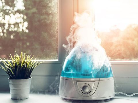 The white humidifier moistens dry air. Improving the comfort of living in the home, apartment. Improving the well-being of people.
