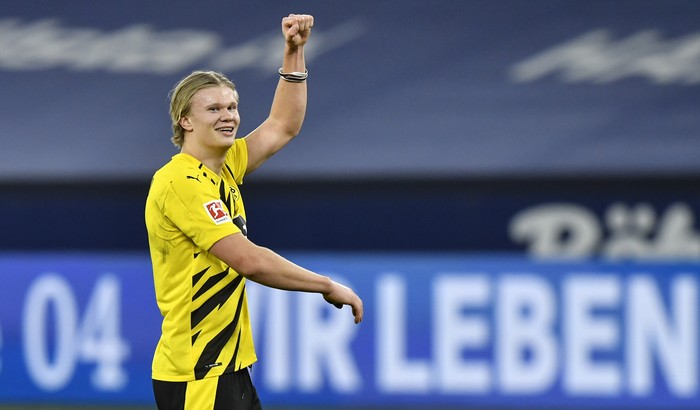 Dortmunds scorer Erling Haaland celebrates after winning the German Bundesliga soccer match between FC Schalke 04 and Borussia Dortmund in Gelsenkirchen, Germany, Saturday, Feb. 20, 2021. (AP Photo/Martin Meissner, Pool)
