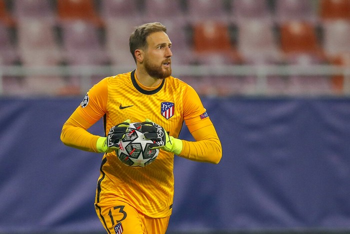 Jan Oblak Atletico Madrid's goalkeeper Jan Oblak holds the ball during the Champions League, round of 16, first leg soccer match between Atletico Madrid and Chelsea at the National Arena stadium in Bucharest, Romania, Tuesday, Feb. 23, 2021. (AP Photo/Vadim Ghirda)