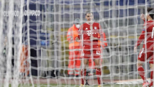 Bayern's Jamal Musiala celebrates after scoring his side's second goal during the Champions League round of 16 first leg soccer match between Lazio and Bayern Munich at the Olympic stadium in Rome, Tuesday, Feb. 23, 2021. (AP Photo/Gregorio Borgia)