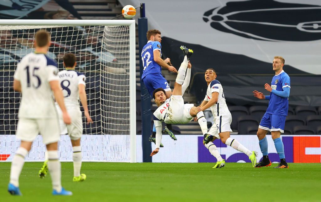 LONDON, ENGLAND - FEBRUARY 24: Dele Alli of Tottenham Hotspur scores their team's first goal with a overhead kick during the UEFA Europa League Round of 32 match between Tottenham Hotspur and Wolfsberger AC at The Tottenham Hotspur Stadium on February 24, 2021 in London, England. Sporting stadiums around the UK remain under strict restrictions due to the Coronavirus Pandemic as Government social distancing laws prohibit fans inside venues resulting in games being played behind closed doors. (Photo by Julian Finney/Getty Images)