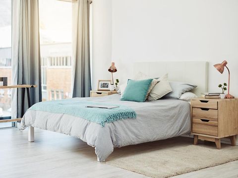 Cropped shot of an empty and neatly arranged bedroom at home during the day