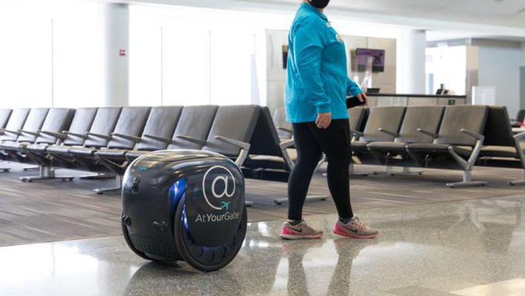 Foto: Robot Gita, Si Pengantar Makanan di Bandara Foto: Robot Gita, Si Pengantar Makanan di Bandara
