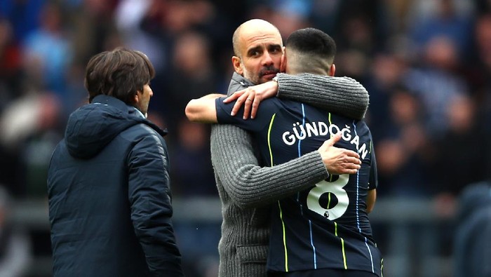 BURNLEY, ENGLAND - APRIL 28: Josep Guardiola, Manager of Manchester City celebrates victory with Ilkay Gundogan after the Premier League match between Burnley FC and Manchester City at Turf Moor on April 28, 2019 in Burnley, United Kingdom. (Photo by Clive Brunskill/Getty Images)
