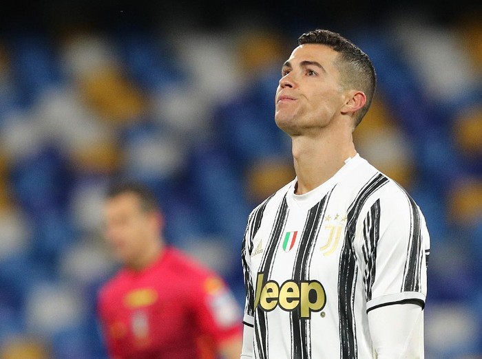 NAPLES, ITALY - FEBRUARY 13: Cristiano Ronaldo of Juventus reacts during the Serie A match between SSC Napoli  and Juventus at Stadio Diego Armando Maradona on February 13, 2021 in Naples, Italy. Sporting stadiums around Italy remain under strict restrictions due to the Coronavirus Pandemic as Government social distancing laws prohibit fans inside venues resulting in games being played behind closed doors. (Photo by Francesco Pecoraro/Getty Images)