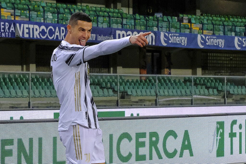 Cristiano Ronaldo celebrates his 0-1 goal during the Italian Serie A soccer match between Verona and Juventus at the Bentegodi stadium in Verona, Italy, on Saturday, Feb. 27, 2021. (Paola Garbuio/LaPresse via AP)
