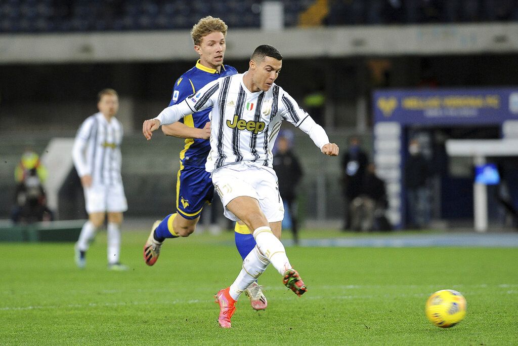 Cristiano Ronaldo celebrates his 0-1 goal during the Italian Serie A soccer match between Verona and Juventus at the Bentegodi stadium in Verona, Italy, on Saturday, Feb. 27, 2021. (Paola Garbuio/LaPresse via AP)