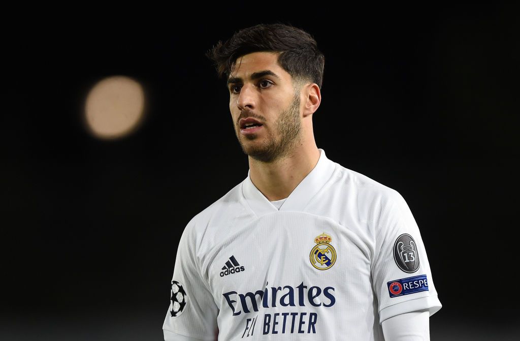 MADRID, SPAIN - DECEMBER 09:   Marco Asensio of Real Madrid looks on during the UEFA Champions League Group B stage match between Real Madrid and Borussia Moenchengladbach at Estadio Alfredo di Stefano on December 09, 2020 in Madrid, Spain. Sporting stadiums around Spain remain under strict restrictions due to the Coronavirus Pandemic as Government social distancing laws prohibit fans inside venues resulting in games being played behind closed doors. (Photo by Denis Doyle/Getty Images)
