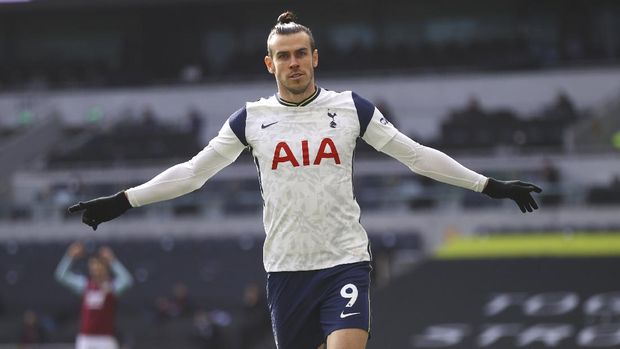 Tottenham's Gareth Bale celebrates after scoring his side's opening goal during an English Premier League soccer match between Tottenham Hotspur and Burnley at the Tottenham Hotspur Stadium in London, England, Sunday, Feb. 28. 2021. (Julian Finney/Pool via AP)
