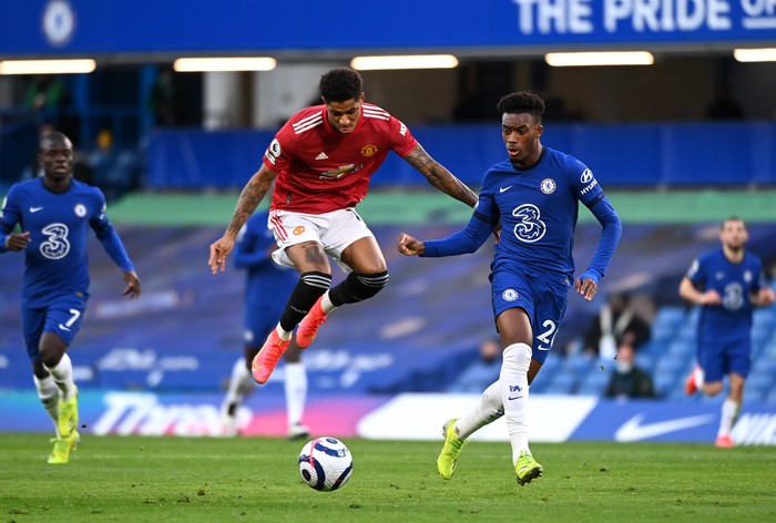 LONDON, ENGLAND - FEBRUARY 28: Marcus Rashford of Manchester United battles for possession with Callum Hudson-Odoi of Chelsea  during the Premier League match between Chelsea and Manchester United at Stamford Bridge on February 28, 2021 in London, England. Sporting stadiums around the UK remain under strict restrictions due to the Coronavirus Pandemic as Government social distancing laws prohibit fans inside venues resulting in games being played behind closed doors. (Photo by Andy Rain - Pool/Getty Images)