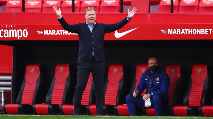 SEVILLE, SPAIN - FEBRUARY 27: Ronald Koeman, Head Coach of FC Barcelona reacts during the La Liga Santander match between Sevilla FC and FC Barcelona at Estadio Ramon Sanchez Pizjuan on February 27, 2021 in Seville, Spain. Sporting stadiums around Spain remain under strict restrictions due to the Coronavirus Pandemic as Government social distancing laws prohibit fans inside venues resulting in games being played behind closed doors. (Photo by Fran Santiago/Getty Images)