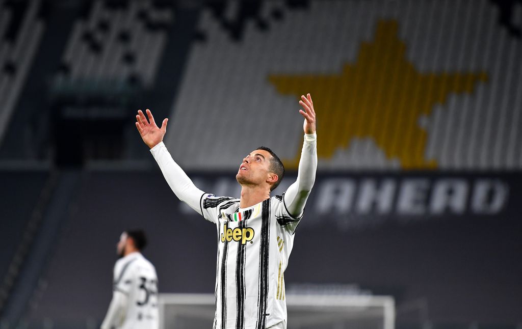 TURIN, ITALY - MARCH 02: Cristiano Ronaldo of Juventus reacts during the Serie A match between Juventus and Spezia Calcio at Allianz Stadium on March 02, 2021 in Turin, Italy. Sporting stadiums around the Italy remain under strict restrictions due to the Coronavirus Pandemic as Government social distancing laws prohibit fans inside venues resulting in games being played behind closed doors. (Photo by Valerio Pennicino/Getty Images)