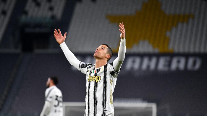 TURIN, ITALY - MARCH 02: Cristiano Ronaldo of Juventus reacts during the Serie A match between Juventus and Spezia Calcio at Allianz Stadium on March 02, 2021 in Turin, Italy. Sporting stadiums around the Italy remain under strict restrictions due to the Coronavirus Pandemic as Government social distancing laws prohibit fans inside venues resulting in games being played behind closed doors. (Photo by Valerio Pennicino/Getty Images)