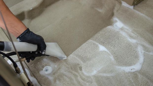 Wash the car carpet.Detailing on interior of modern car.