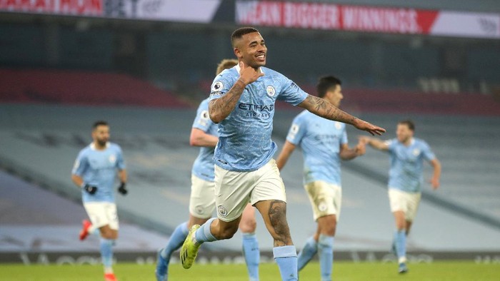 MANCHESTER, ENGLAND - MARCH 02: Gabriel Jesus of Manchester City celebrates after scoring their sides second goal during the Premier League match between Manchester City and Wolverhampton Wanderers at Etihad Stadium on March 02, 2021 in Manchester, England. Sporting stadiums around the UK remain under strict restrictions due to the Coronavirus Pandemic as Government social distancing laws prohibit fans inside venues resulting in games being played behind closed doors. (Photo by Carl Recine - Pool/Getty Images)