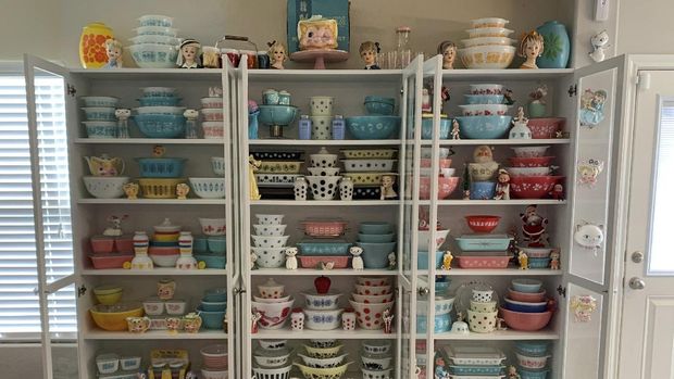 This image provided by Megan Telfer shows the wide selection of antique Pyrex dishes she displays at her Texas home. Telfer has more than 300 pieces of vintage Pyrex, displayed on three large bookcases. Telfer's 5-year-old daughter has some vintage Pyrex, too. 