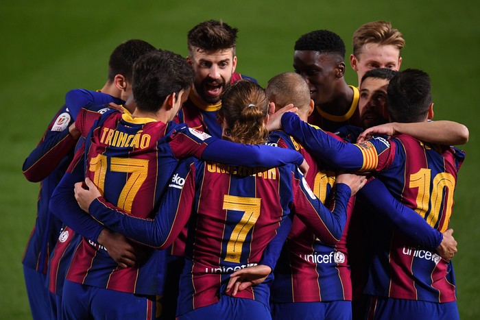 Barcelona BARCELONA, SPAIN - MARCH 03: Martin Braithwaite of FC Barcelona celebrates with Trincao, Antoine Griezmann and Lionel Messi after scoring their side's third goal during the Copa del Rey Semi Final Second Leg match between FC Barcelona and Sevilla at Camp Nou on March 03, 2021 in Barcelona, Spain. Sporting stadiums around Spain remain under strict restrictions due to the Coronavirus Pandemic as Government social distancing laws prohibit fans inside venues resulting in games being played behind closed doors. (Photo by David Ramos/Getty Images)
