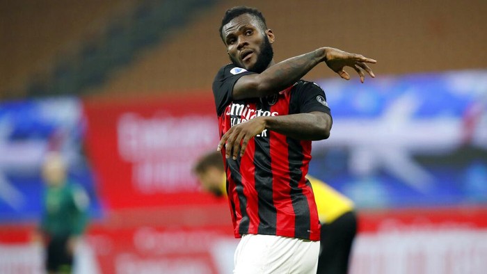 AC Milan midfielder Franck Kessie (79) reacts after scoring from the penalty spot during the Serie A soccer match between AC Milan and Udinese at the San Siro stadium, in Milan, Italy, Wednesday, March 3, 2021. (AP Photo/Antonio Calanni)
