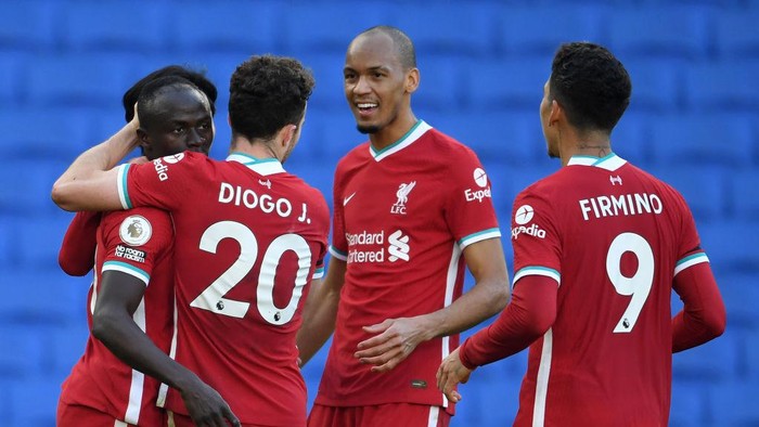 BRIGHTON, ENGLAND - NOVEMBER 28: Sadio Mane of Liverpool celebrates with teammates Diogo Jota, Fabinho, and Roberto Firminho after scoring a goal which was then disallowed during the Premier League match between Brighton & Hove Albion and Liverpool at American Express Community Stadium on November 28, 2020 in Brighton, England. Sporting stadiums around the UK remain under strict restrictions due to the Coronavirus Pandemic as Government social distancing laws prohibit fans inside venues resulting in games being played behind closed doors. (Photo by Mike Hewitt/Getty Images)