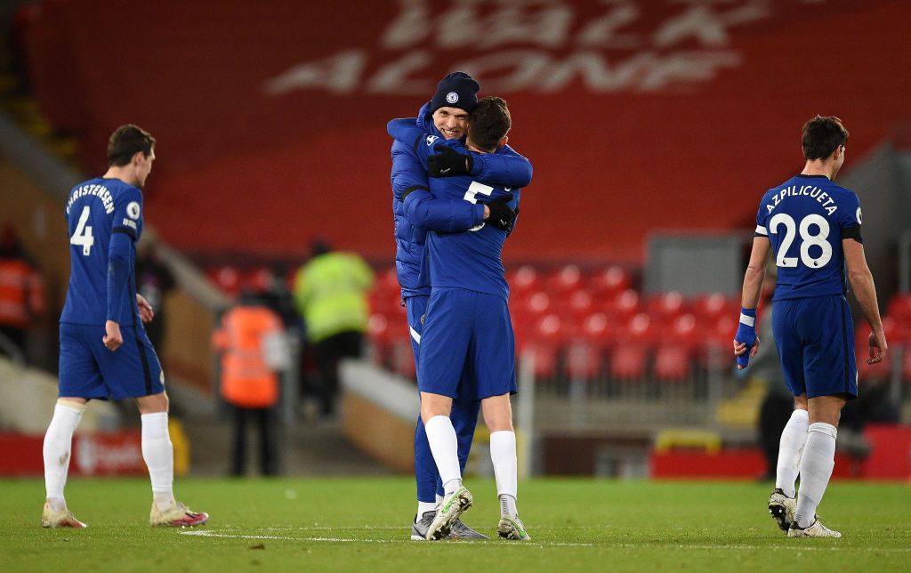 LIVERPOOL, ENGLAND - MARCH 04: Thomas Tuchel, Manager of Chelsea celebrates with Jorginho of Chelsea following victory in the Premier League match between Liverpool and Chelsea at Anfield on March 04, 2021 in Liverpool, England. Sporting stadiums around the UK remain under strict restrictions due to the Coronavirus Pandemic as Government social distancing laws prohibit fans inside venues resulting in games being played behind closed doors. (Photo by Oli Scarff - Pool/Getty Images)