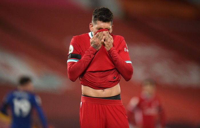 LIVERPOOL, ENGLAND - MARCH 04: Roberto Firmino of Liverpool reacts during the Premier League match between Liverpool and Chelsea at Anfield on March 04, 2021 in Liverpool, England. Sporting stadiums around the UK remain under strict restrictions due to the Coronavirus Pandemic as Government social distancing laws prohibit fans inside venues resulting in games being played behind closed doors. (Photo by Oli Scarff - Pool/Getty Images)
