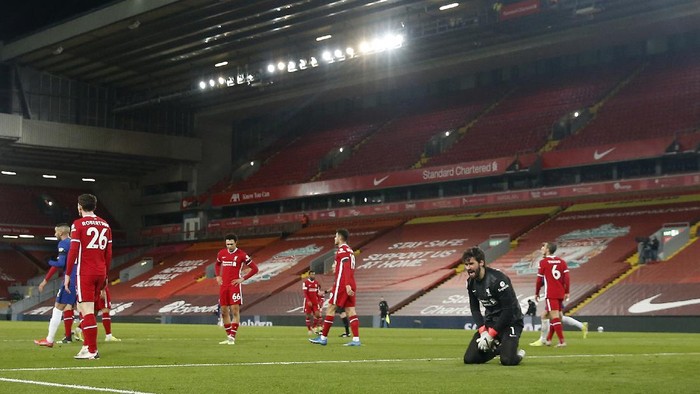 Liverpools goalkeeper Alisson, second from right, reacts after Chelseas Mason Mount scored during the English Premier League soccer match between Liverpool and Chelsea at Anfield stadium in Liverpool, England, Thursday, March 4, 2021. (Phil Noble, Pool via AP)