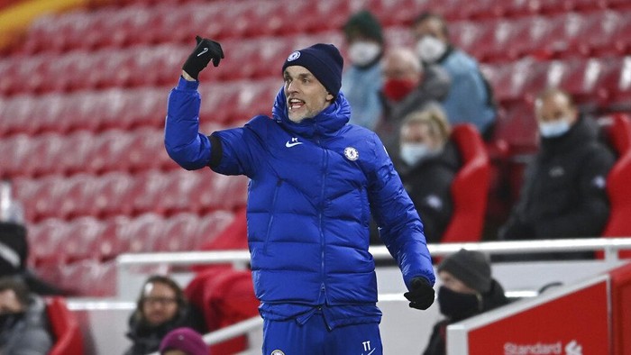 Chelseas head coach Thomas Tuchel gives instructions during the English Premier League soccer match between Liverpool and Chelsea at Anfield stadium in Liverpool, England, Thursday, March 4, 2021. (Laurence Griffiths, Pool via AP)