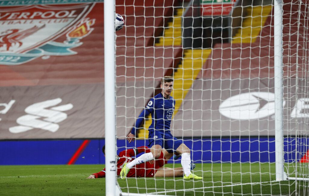 Chelsea's Timo Werner walks during the English Premier League soccer match between Liverpool and Chelsea at Anfield stadium in Liverpool, England, Thursday, March 4, 2021. (Laurence Griffiths, Pool via AP)
