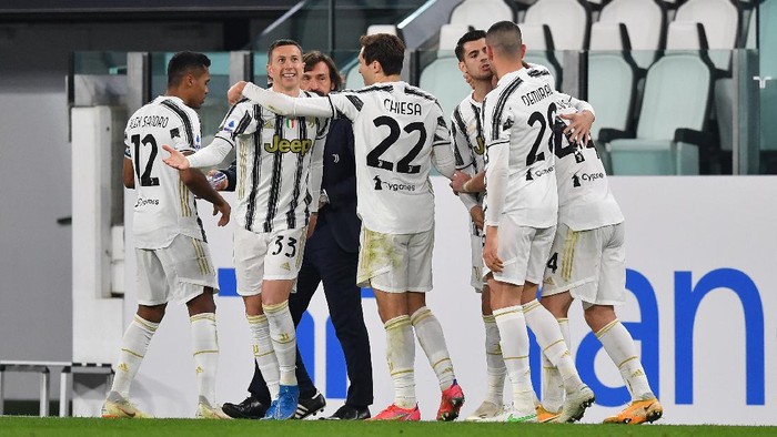 TURIN, ITALY - MARCH 02: Alvaro Morata of Juventus celebrates with team mates Merih Demiral and Dejan Kulusevski after scoring their sides first goal during the Serie A match between Juventus and Spezia Calcio at Allianz Stadium on March 02, 2021 in Turin, Italy. Sporting stadiums around the Italy remain under strict restrictions due to the Coronavirus Pandemic as Government social distancing laws prohibit fans inside venues resulting in games being played behind closed doors. (Photo by Valerio Pennicino/Getty Images)