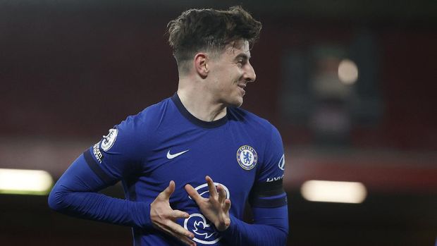 Chelsea's Mason Mount after scoring his side's opening goal during the English Premier League soccer match between Liverpool and Chelsea at Anfield stadium in Liverpool, England, Thursday, March 4, 2021. (Phil Noble, Pool via AP)