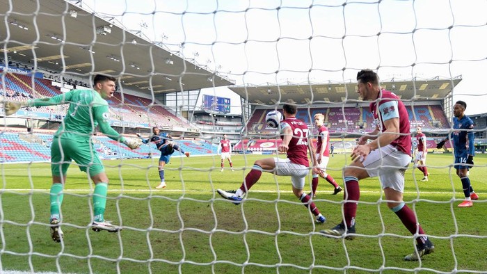 BURNLEY, ENGLAND - MARCH 06: Erik Pieters of Burnley defends a shot on goal with his shoulder, leading to a Red Card and penalty to Arsenal decision, which were both overruled following a VAR review during the Premier League match between Burnley and Arsenal at Turf Moor on March 06, 2021 in Burnley, England. Sporting stadiums around the UK remain under strict restrictions due to the Coronavirus Pandemic as Government social distancing laws prohibit fans inside venues resulting in games being played behind closed doors. (Photo by Peter Powell - Pool/Getty Images)
