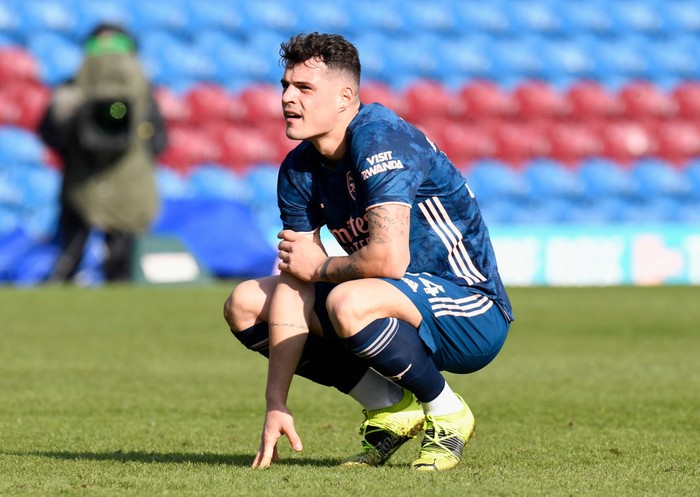 BURNLEY, ENGLAND - MARCH 06: Granit Xhaka of Arsenal looks dejected following the Premier League match between Burnley and Arsenal at Turf Moor on March 06, 2021 in Burnley, England. Sporting stadiums around the UK remain under strict restrictions due to the Coronavirus Pandemic as Government social distancing laws prohibit fans inside venues resulting in games being played behind closed doors. (Photo by Peter Powell - Pool/Getty Images)