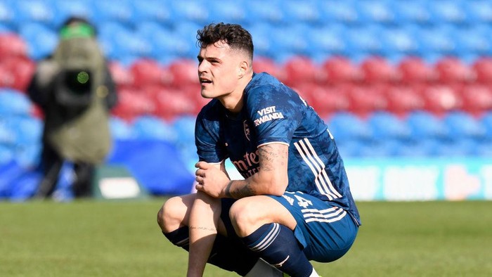 BURNLEY, ENGLAND - MARCH 06: Granit Xhaka of Arsenal looks dejected following the Premier League match between Burnley and Arsenal at Turf Moor on March 06, 2021 in Burnley, England. Sporting stadiums around the UK remain under strict restrictions due to the Coronavirus Pandemic as Government social distancing laws prohibit fans inside venues resulting in games being played behind closed doors. (Photo by Peter Powell - Pool/Getty Images)