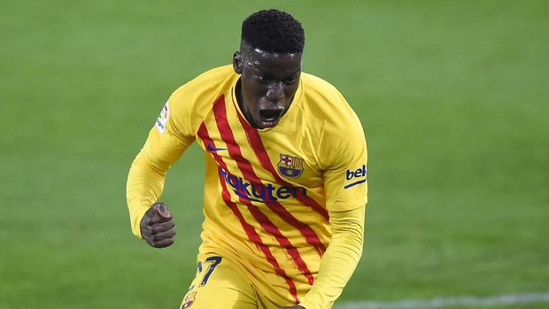 Barcelona's Spanish midfielder Ilaix Moriba celebrates after scoring during the Spanish League football match between CA Osasuna and FC Barcelona at El Sadar stadium in Pamplona on March 6, 2021. (Photo by ANDER GILLENEA / AFP)