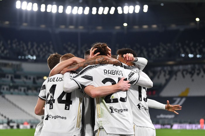 TURIN, ITALY - MARCH 06: Adrien Rabiot of Juventus celebrates with teammates after scoring their teams first goal  during the Serie A match between Juventus  and SS Lazio at Allianz Stadium on March 06, 2021 in Turin, Italy. Sporting stadiums around Italy remain under strict restrictions due to the Coronavirus Pandemic as Government social distancing laws prohibit fans inside venues resulting in games being played behind closed doors. (Photo by Valerio Pennicino/Getty Images)