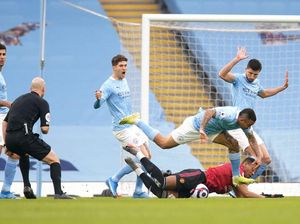 Guardiola: MU Masih Bisa Salip Man City dan Juara