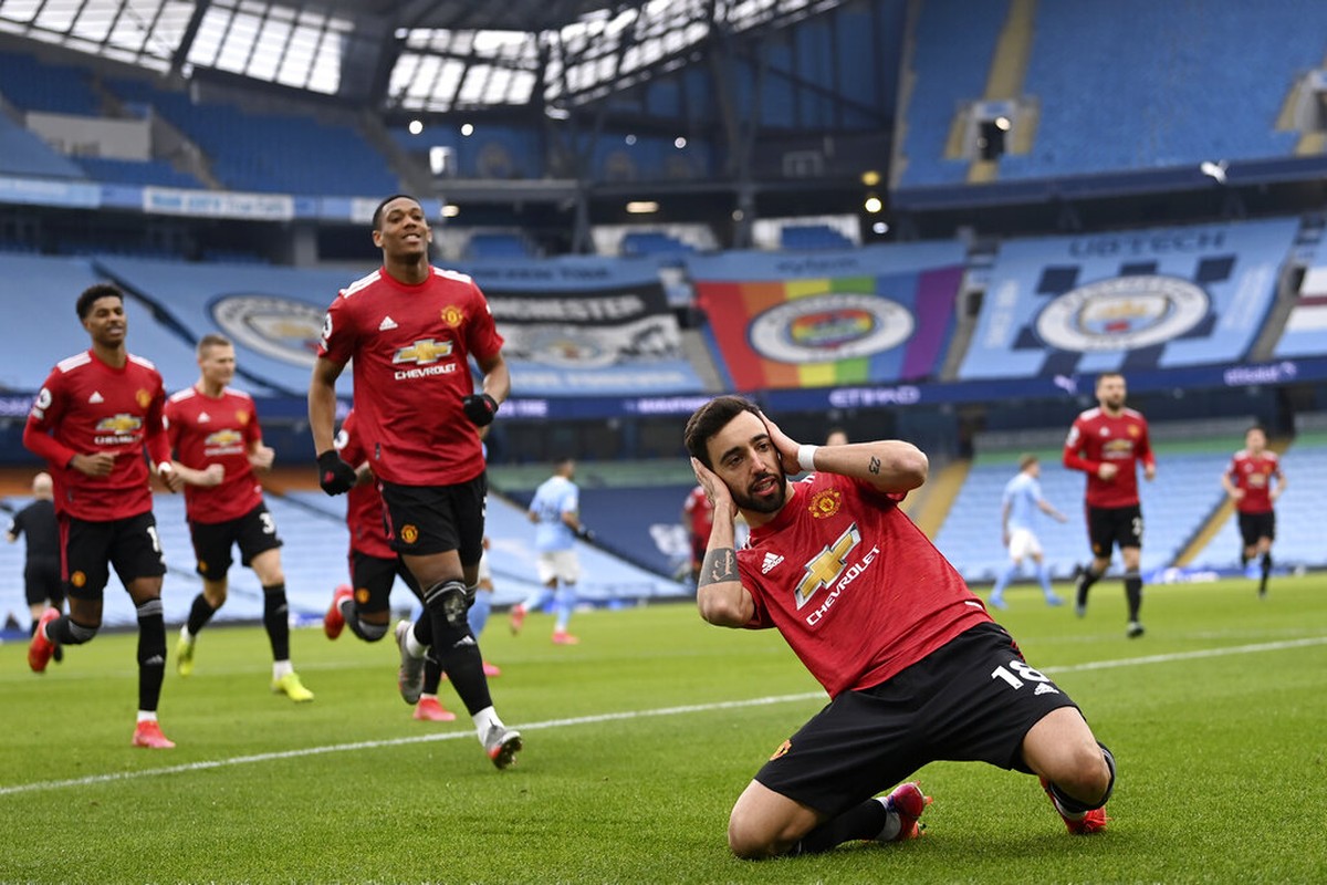 Kesetanan Apa Manchester United? (AP/Laurence Griffiths)